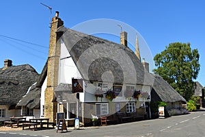 The Axe and Compass public house on the little village square at Hemmingford Abbots Cambridgeshire.