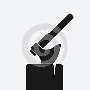 Axe in log black silhouette on white background