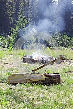 Axe in Log and Bonfire