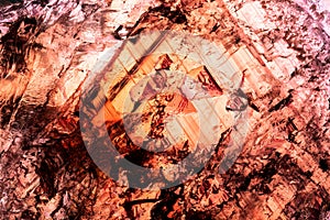 axinite crystal with Pleochroism macro detail texture background photo