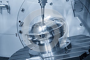 The 5-axis CNC milling machine cutting the high precision turbine part with solid ball end mill tool photo