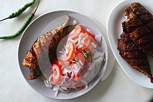 Ayala Meen fry or Mackerel fish fry. Spicy fish fry prepared in South Indian style. Mackerel fish marinated in an oil marinade and