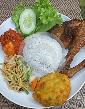 Ayam Goreng or Indonesian Fried Chicken with Telur Balado, Perkedel Jagung and Mie Goreng