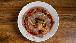 Ayam masak merah is a Malaysian traditional dish photo