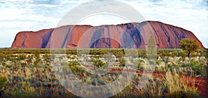 Ayers Rock, Uluru, glowing in evening sun, Outback, Australia