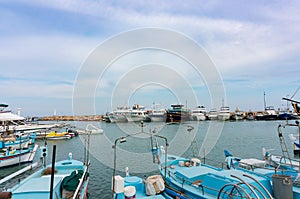 Ayia Napa, Cyprus - June 2, 2018: Port of Ayia Napa. The port has moored numerous fishing boats, tourist boats and luxury yachts