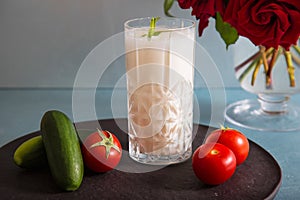 Ayran - liquid drink made from yogurt in ransparent glass cup