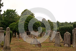 Ayton cemetery and Castle tower Berwickshire on dull day
