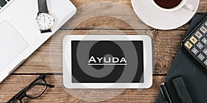 Ayuda, Spanish text for Help on screen of tablet computer at off photo