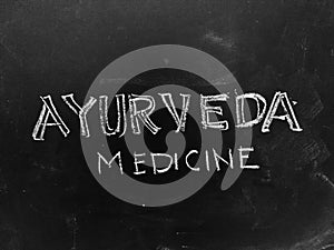 Ayurveda Medicine Handwritten on Blackboard