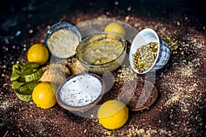 Ayurvedic face pack or ubtan of moong dal or green lentil or mung dal with lemon,dried orange peel powder,chandan powder or sandal