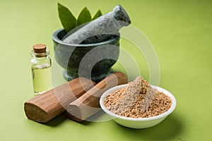 Ayurvedic sandalwood powder, oil and paste photo