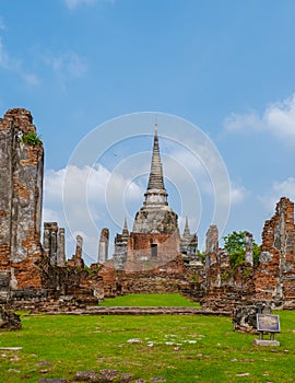 Ayutthaya, Thailand at Wat Phra Si Sanphet, couple men and women with a hat visiting Ayyuthaya Thailand