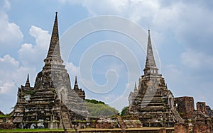 Ayutthaya, Thailand at Wat Phra Si Sanphet, couple men and women with a hat visiting Ayyuthaya Thailand