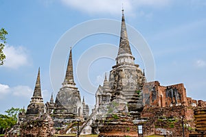 Ayutthaya, Thailand at Wat Phra Si Sanphet, couple men and women with a hat visiting Ayyuthaya Thailand