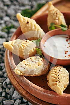 Azerbaijani Fried Dumplings Giurza with Minced lamb Meat also known as Gyoza