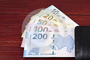 Azerbaijani Manat in the black wallet