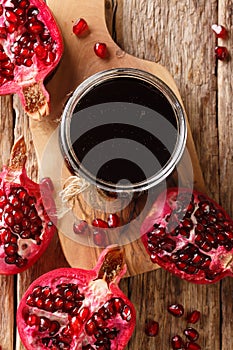 Azerbaijani narsharab seasoning obtained by thickening pomegranate juice close-up. Vertical top view