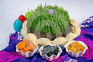 Azerbaijani national, festive treats: painted eggs, Xiamen, pastries, shekerburas, black raisins.