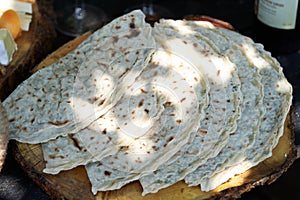 Azerbaijani traditional cuisine - Kutabs or Gozleme with herbs or meat