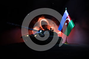 Azeri army concept. Silhouette of armed soldiers against Azerbaijani flag. Creative artwork decoration. Military silhouettes