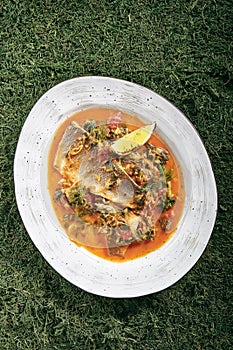 Azeri Syrdak with Sea Bass, Vegetables and Leek on Natural Moss
