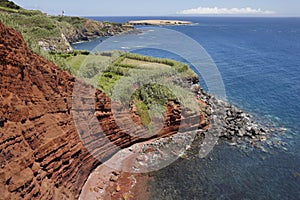 Azores coastline landscape with red cliffs in Topo. Sao Jorge