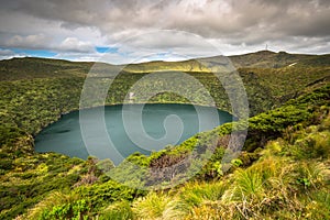 Azores landscape with lake in Flores island. Caldeira Funda. Portugal. Horizontal