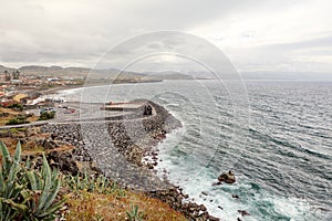 Azores seascape of city and ocean shore