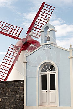 Azores traditional chapel, imperio, and windmill in Sao Miguel. photo