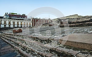 Aztec Temple Templo Mayor and serpent head at ruins of Tenochtitlan - Mexico City, Mexico photo