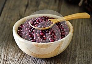 Azuki beans in wood bowl on table