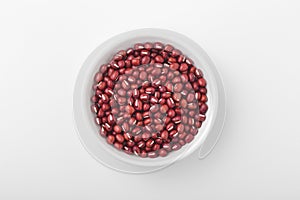 Azuki red bean in white bowl on white background
