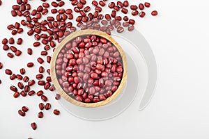 Azuki red bean in wooden bowl on white background