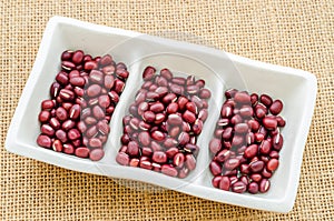 Azuki red beans in white cup.