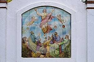 Tile mosaic Ascension of the Lord located on the road to El RocÃÂ­o, Almonte, Spain photo