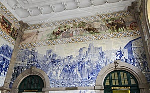 Azulejo panel in Sao Bento Railway Station in Porto, Portugal photo