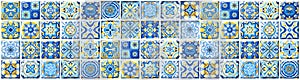 Azulejo tiles, blue and yellow square pattern, Portuguese and Spanish ceramic tilework photo