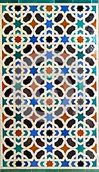 Azulejos of Alcazar Seville. Tiles Al Andalus Arab pattern decoration photo