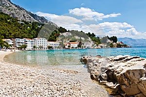 Azure Adriatic Bay and Rocky Breakwater