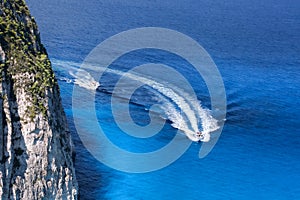 Azure bay with boats in Greek sea