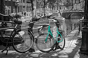 An azure bike on the streets of Amsterdam.