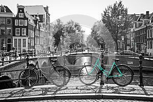 An azure bike on the streets of Amsterdam.