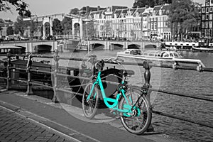 An azure bike on the streets of Amsterdam.