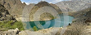 Azure blue reservoir lake in Jalalabad, Kyrgyzstan.