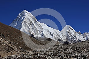 Azure blue sky over mount Pumori