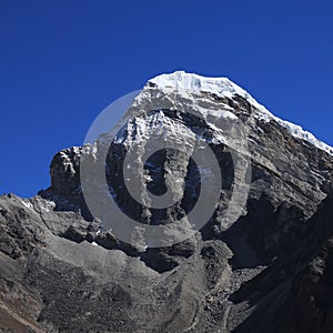 Azure blue sky over a peak near Gokyo