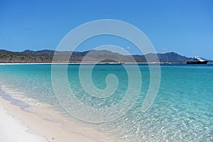 The Azure Blue Water And White Silica Sand Of A Beach In Whitsundays Australia