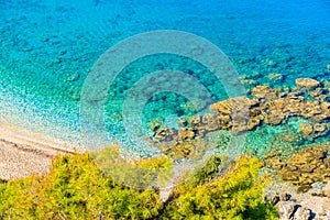 Azure sea on coast of Samos island on Potami beach, Greece