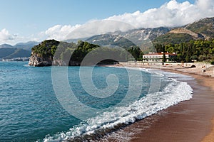 Azure surf on the royal beach near Villa Milocer. Montenegro